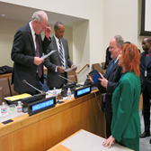 Description: UN SDG negotiations - Dr Judy and Jeff Huffines deliver NGO advocacy to co-chairs Ambassador Kamau and Ambassador Donoghue .jpg